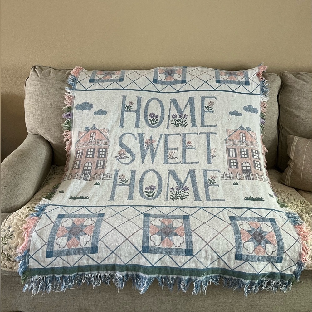 Vintage throw blanket with fringe and cottagecore type pattern